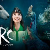 ARC by Erth image of little girl surrounded by animals including a cassowary.
