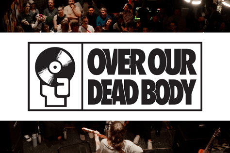 The over our dead body logo on a live music image.